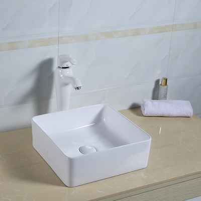 La salle de bains ultra-mince de plan de travail descendent le lavabo carré de porcelaine de forme