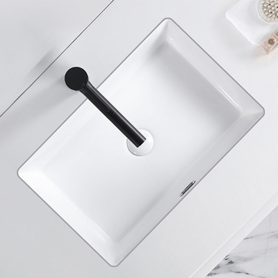 Moderne sous l'évier rectangulaire de lavabo de main d'installation de bâti