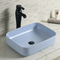 La salle de bains lisse solide de plan de travail descendent facile en céramique maintiennent le lavabo rectangulaire